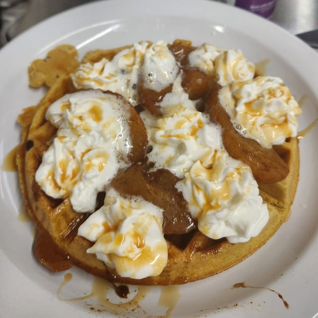 Pumpkin Waffle W/Hot Apples & Caramel.
