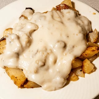 Sausage Gravy with Homefries or Grits